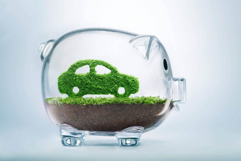 Piggybank with green car inside